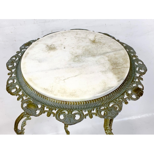 132 - A vintage brass and marble top plantstand. 72.5cm.