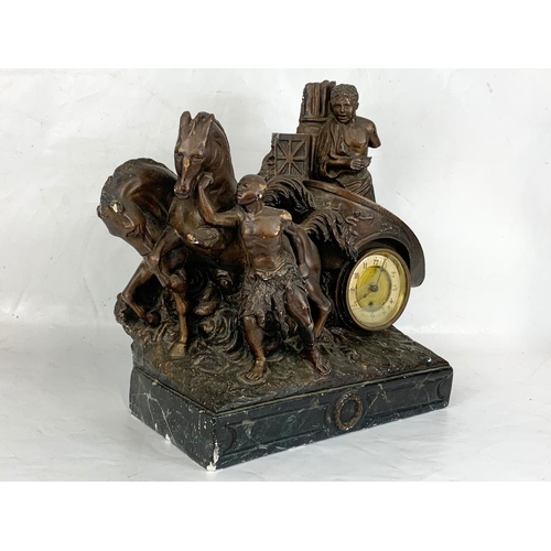 137 - A large 19th century French mantle clock on slate base with a pair of late 19th century spelter figu... 