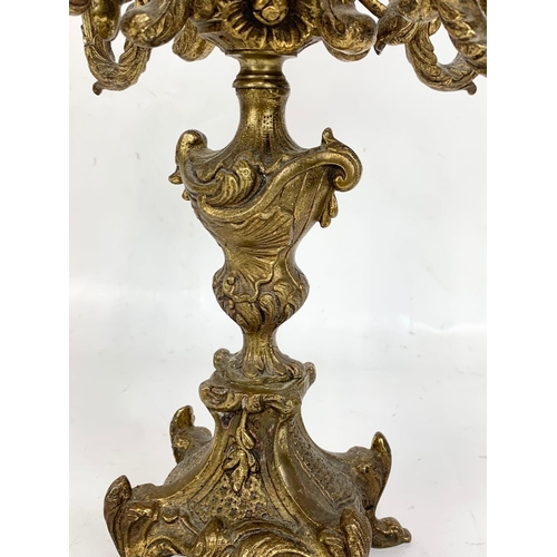 138 - A late 19th century brass candelabra. 26 x 46cm