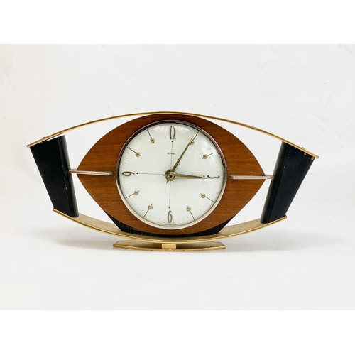 15 - A 1950’s-60’s Mid Century brass mantle clock by Metamec. 31 x 15cm.