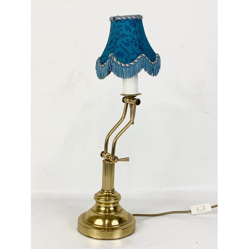 152 - A brass desk lamp. 40cm