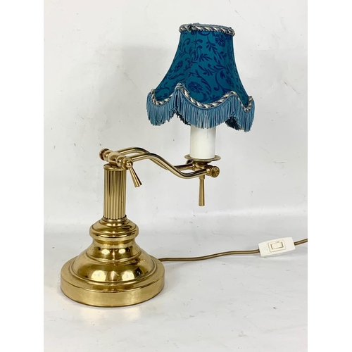 152 - A brass desk lamp. 40cm