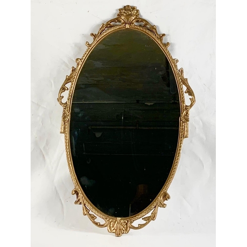 157 - 2 ornate brass framed mirrors. 47 x 56cm, 39.5 x 66cm