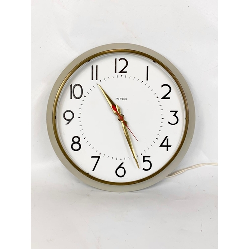 16 - A vintage Pifco Metamec wall clock. 1950’s-60’s. 27cm.