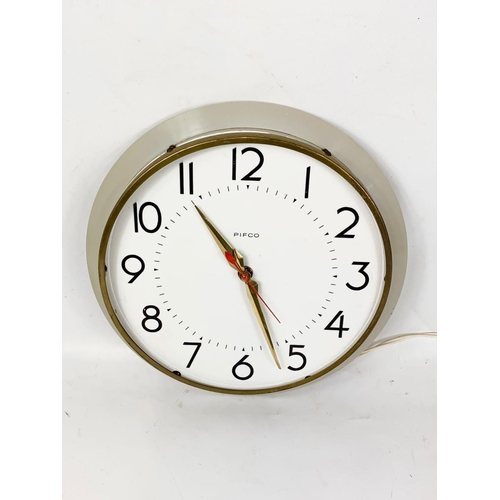 16 - A vintage Pifco Metamec wall clock. 1950’s-60’s. 27cm.