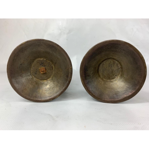 162 - A pair of vintage Middle Eastern brass vases. 23.5cm