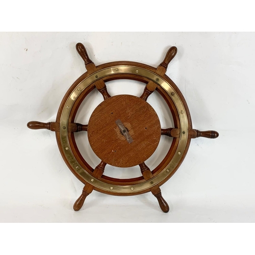 17 - A good quality late 19th century brass and oak ships wheel. 77cm