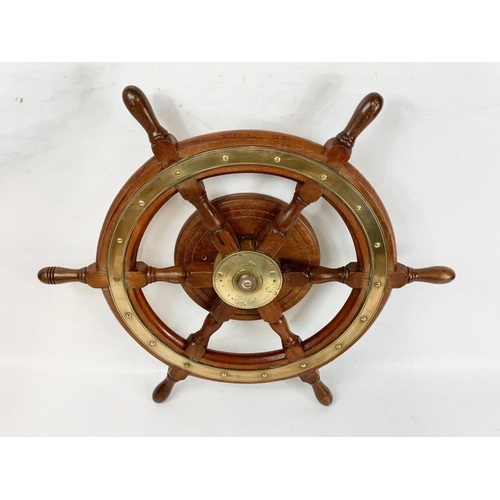 17 - A good quality late 19th century brass and oak ships wheel. 77cm