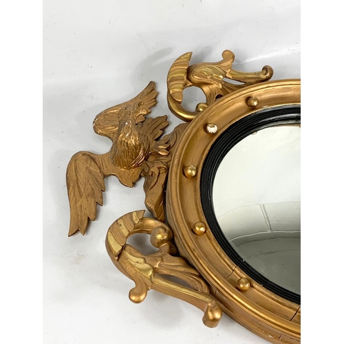 187 - A late 19th century Regency style convex mirror. Circa 1890-1900.