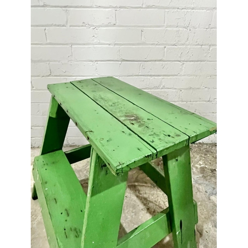 194 - A vintage painted pine stool. 51cm x 48.5cm