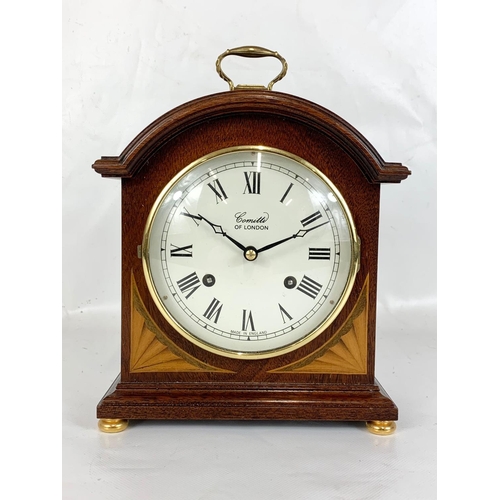 2 - An inlaid mahogany mantle clock. Comitti of London. 18 x 8.5 x 25cm.