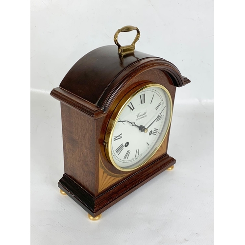 2 - An inlaid mahogany mantle clock. Comitti of London. 18 x 8.5 x 25cm.