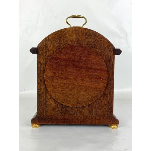 2 - An inlaid mahogany mantle clock. Comitti of London. 18 x 8.5 x 25cm.