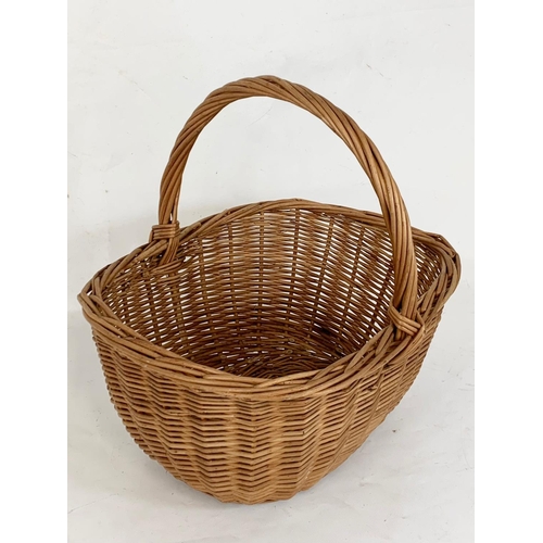 200 - A wicker basket. 38 x 32 x 38cm