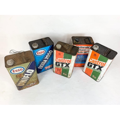 203 - A collection of oil cans. Castrol GTX x2, Esso Extra 2050, Esso Uniflo etc. 29cm