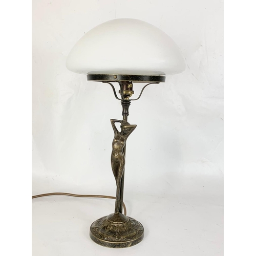 21 - An Art Deco style brass figure lamp in the manner of Aug Moreau. 46cm.