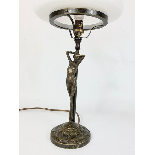 21 - An Art Deco style brass figure lamp in the manner of Aug Moreau. 46cm.