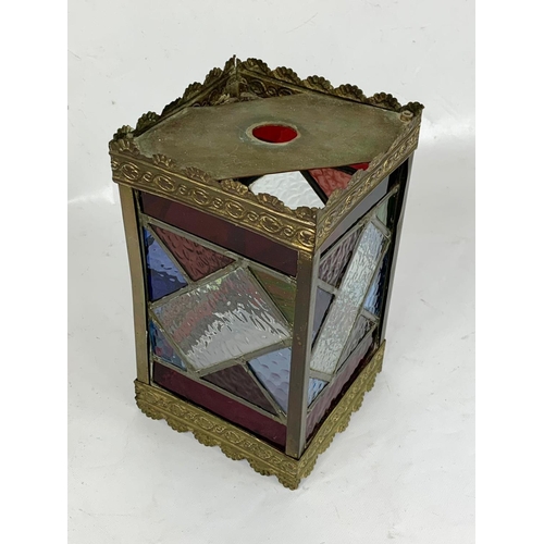 22 - A Victorian brass hall lanterns with 4 stained glass panels. 15.5 x 26.5cm