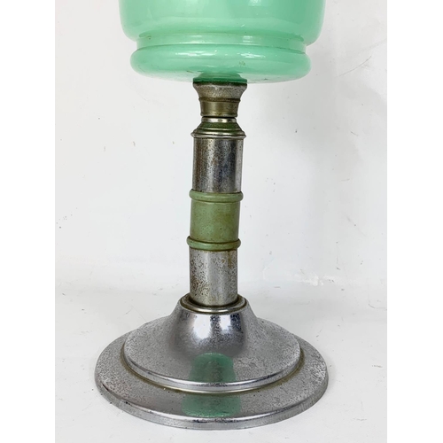 234 - A late Victorian oil lamp. 54cm