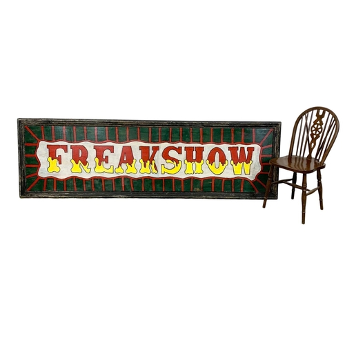 248 - A large vintage wooden Freakshow  carnival sign. 244 x 73cm.