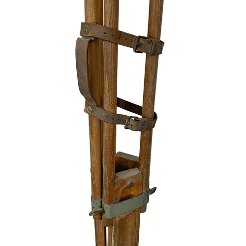 249 - An early 20th century adjustable tripod stand. 144cm.