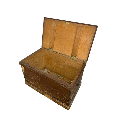 250 - A Victorian pine storage trunk. 63 x 38 x 38.5cm