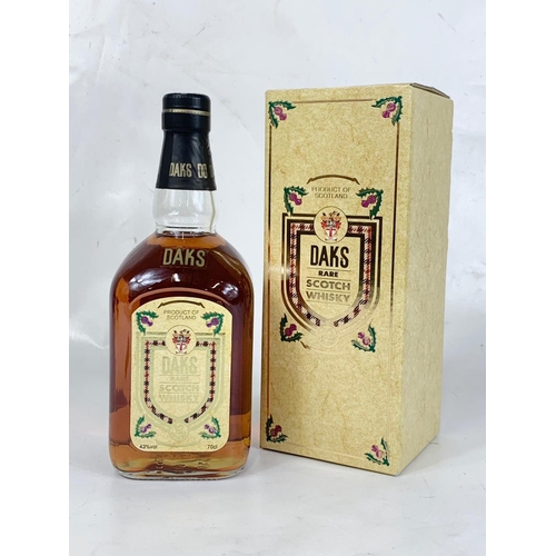 26 - A bottle of Daks 12 Year Old Rare Scotch Whisky in box. 70cl.