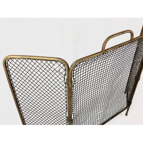 265 - A late Victorian brass filing fire screen. 81 x 57cm