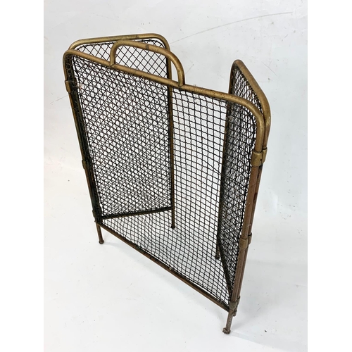 265 - A late Victorian brass filing fire screen. 81 x 57cm