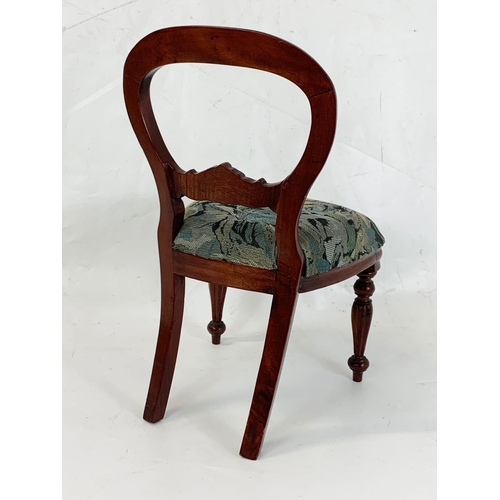 267 - A Victorian style dolls chair. 44cm