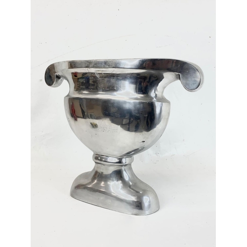 268 - A chrome urn. 50 x 40cm