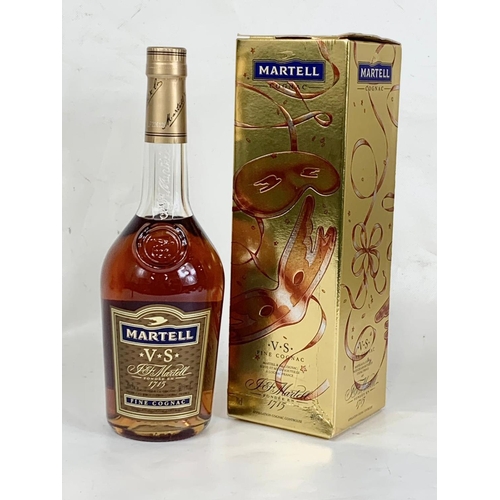 27 - A bottle of Martell VS Fine Cognac in box. 70cl.