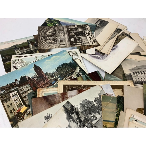 300 - A large quantity of vintage postcards.