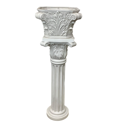 305 - A large vintage pottery jardiniere on stand with Corinthian style pillars. 34 x 119.5cm.