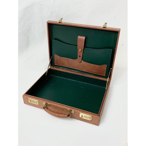 313 - A leather Jaguar briefcase. 43 x 32 x 10cm.