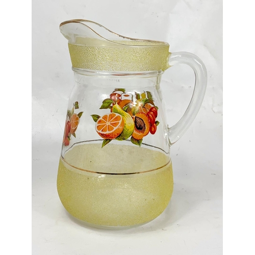 394 - A 6 piece vintage French drinks set. Jug measures 21.5cm. Glasses measure 12cm.