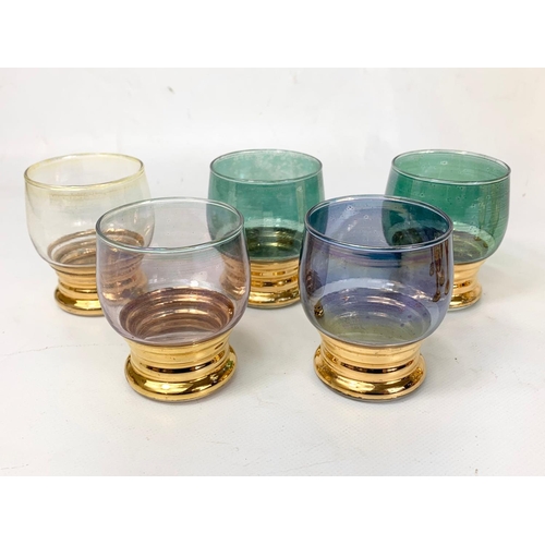 395 - 2 sets of vintage drinking glasses. A set of 5 gold rimmed glazed 7.5cm, 6 small Amber Glass Sherry ... 