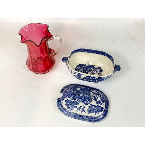 402 - A Victorian Ruby Glass jug and a Victorian Ridgway & Co blue and white tureen. Jug measures 16.5cm