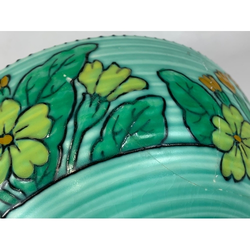 408 - A Charlotte Rhead “Primula” bowl. For Crown Ducal 1930’s. 23 x 9cm