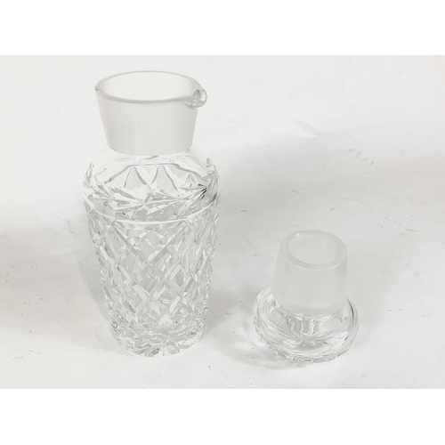 417 - A large Waterford crystal decanter with spout. 28cm