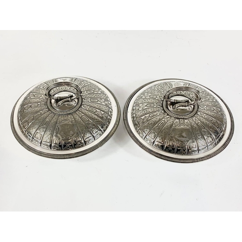 421 - A pair of early 20th century silver plated tureens. 22.5cm