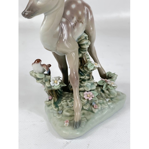 422 - A Lladro “A Faun and a Friend” porcelain figure. 12 x 15cm.