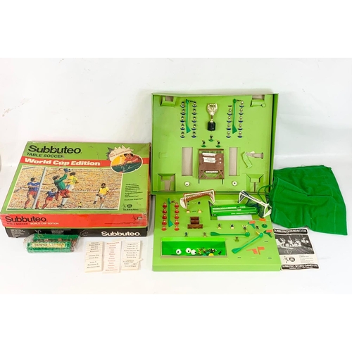 43 - A vintage Subbuteo “World Cup Edition” table soccer game in box. Box measures 56 x 46 x 15cm.