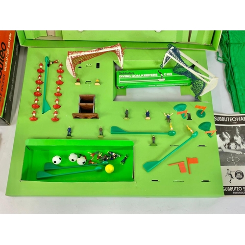 43 - A vintage Subbuteo “World Cup Edition” table soccer game in box. Box measures 56 x 46 x 15cm.