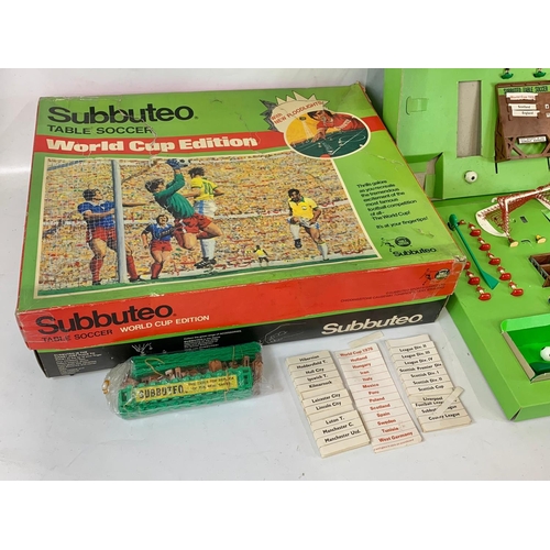 43 - A vintage Subbuteo “World Cup Edition” table soccer game in box. Box measures 56 x 46 x 15cm.