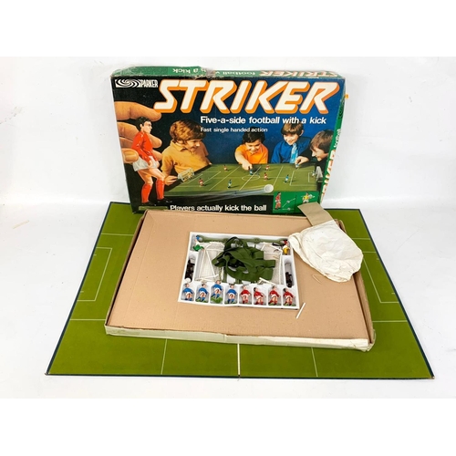 44 - A vintage Parker Striker Five-a-Side football game in box. Box measures 67 x 47cm