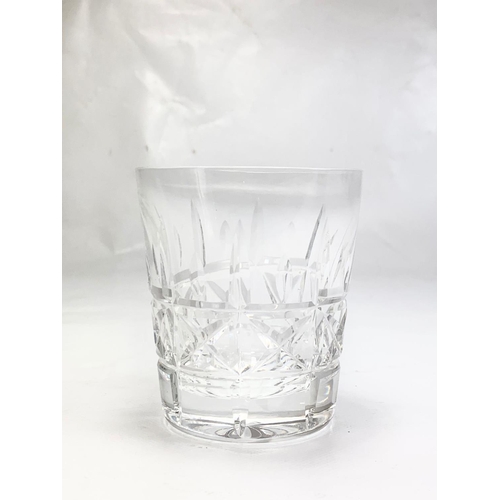 449 - A set of 11 Waterford crystal “Kylemore” whisky glasses. 9cm.