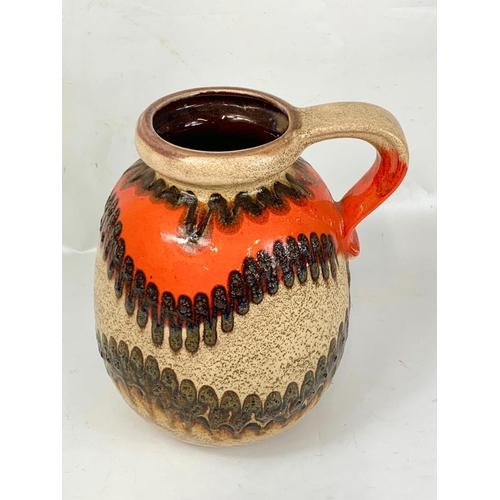 463 - A large West German pottery jug. Mid Century. 484-30. 27 x 30cm.