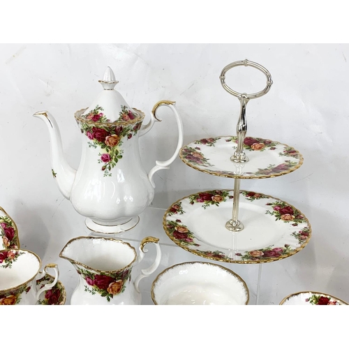 468 - A 28 piece Royal Albert Old Country Roses coffee set. Cakestand 25cm, coffee pot 25cm. 6 cups and 6 ... 