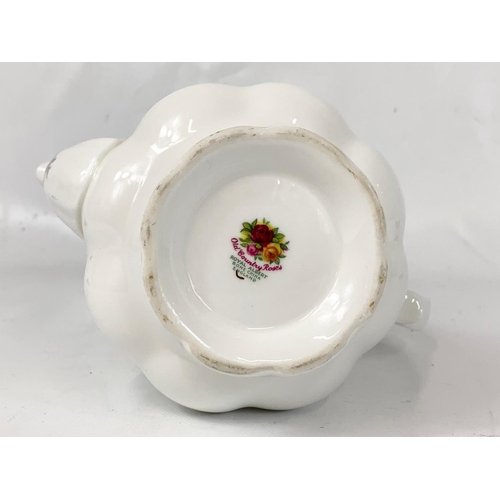 469 - A Royal Albert Old Country Roses coffee pot. 20 x 23.5cm